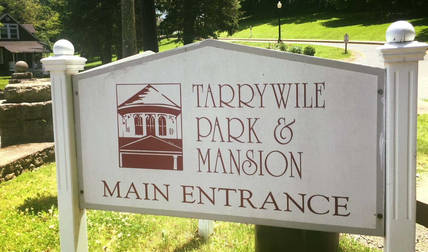 Kat & Jesse, A Gazebo Ceremony tarrywile park and mansion sign at front entrance